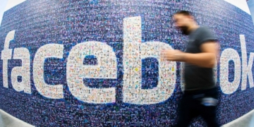 Facebook profit surges as user base grows