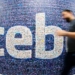 Facebook profit surges as user base grows