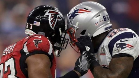 Stuck helmets steals the Super Bowl show