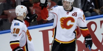 Flames fend off Panthers to extend win streak to 3