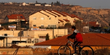 Israeli parliament passes law to retroactively legalize thousands of settlement homes