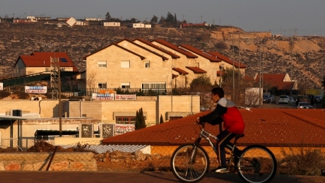 Israeli parliament passes law to retroactively legalize thousands of settlement homes