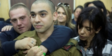 Israeli soldier who shot prone Palestinian assailant, sentenced to 18 months