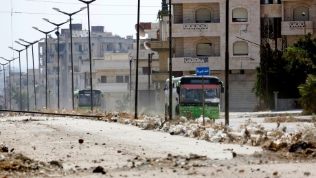 Attack on Syrian security forces in Homs kills dozens, prompts airstrikes