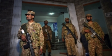 Pakistan security forces go on offensive in raids a day after shrine bombing