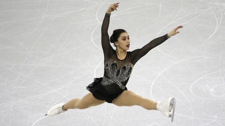 Canadian figure skaters crowd podium at Four Continents