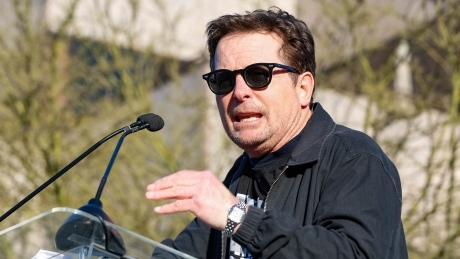 Syrian cinematographer barred from U.S. ahead of Oscars; stars gather at unity rally