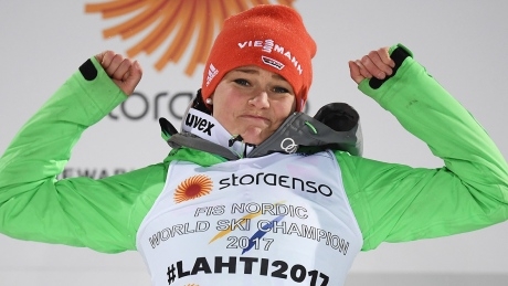 Teary-eyed Vogt claims 1st world ski jump title in 3 years