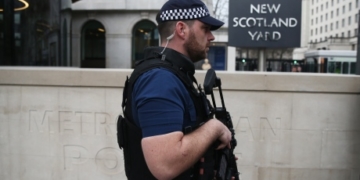 British police say attacker inspired by terrorism; 7 arrested in raids