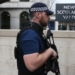British police say attacker inspired by terrorism; 7 arrested in raids