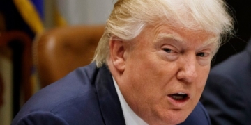 Judge in Hawaii puts Trump’s travel ban on hold