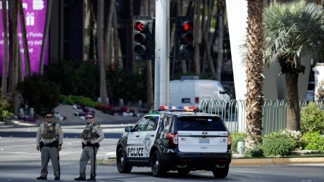 Suspect in fatal shooting barricades himself in bus on Las Vegas strip