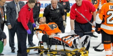 Flyers’ Neuvirth collapses on ice, leaves game on stretcher