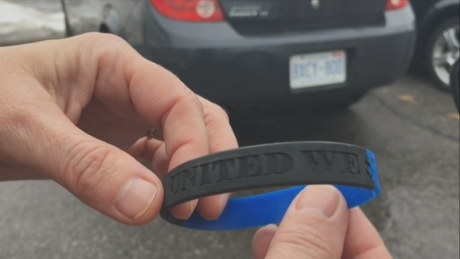 Police divided over wristband support of officer charged in Ottawa man’s death