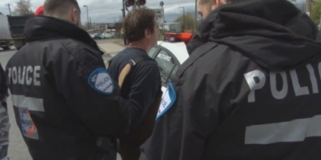 Man arrested while delivering sandbags to flood zone charged with obstructing justice