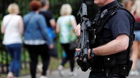 U.K. lowers threat level as 2 more bomb suspects arrested