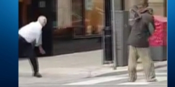 Security guard suspended after video shows him throwing shoes at a homeless man