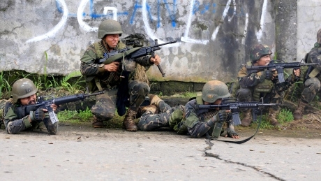 Soldiers roll into Philippine city besieged by ISIS-linked militants
