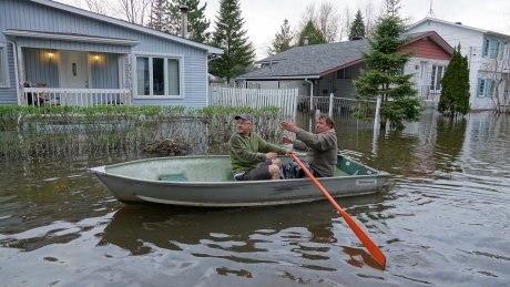 Residents scramble as flooding fills streets, basements in Montreal’s West Island