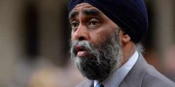 After an odd boast, Harjit Sajjan faces the queries and catcalls of question period