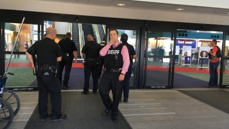 Michigan airport evacuated after police officer stabbed