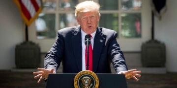 ‘Red meat to the base’: Trump scores points with supporters by rejecting climate deal