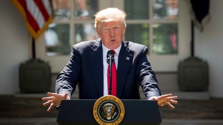 ‘Red meat to the base’: Trump scores points with supporters by rejecting climate deal