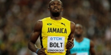 Usain Bolt advances to 100m final at track worlds