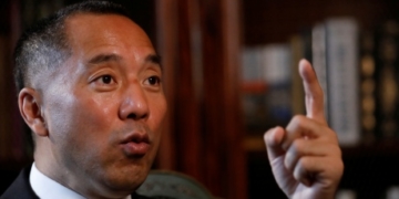 China seeks arrest of billionaire dissident in U.S. on sex assault charges