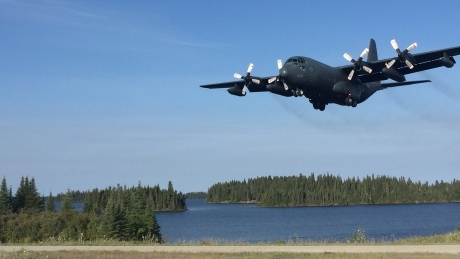 ‘Exhausted’ First Nation evacuees in Manitoba still waiting for flights out of forest fire zone