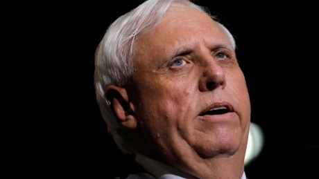 West Virginia governor jumps from Democrats to Republicans at Trump rally