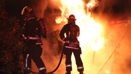 ‘Residents were awoken by a loud bang,’ as fire destroys Surrey home