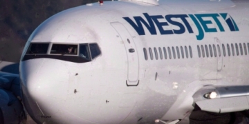 De-icing spray leak into WestJet plane at Calgary airport sends crew member to hospital