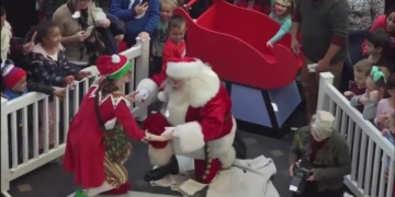 Santa arrives by Indycar, helicopter