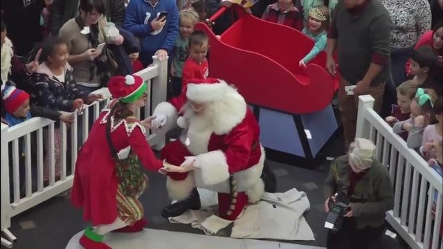 Santa arrives by Indycar, helicopter
