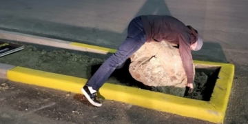 Drivers keep hitting large rock in suburban Calgary parking lot