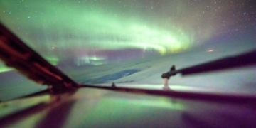 Flying through northern lights 'really surreal' for Calgary photographer