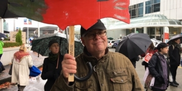 Protesters chant 'Notley go home,' while premier gets warm reception at Vancouver energy forum