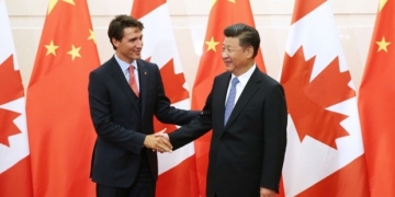 Canadians detained in commercial dispute looming over Trudeau trip to China