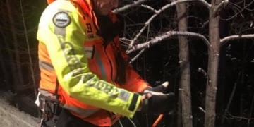 Woman rescued after 14 hours trapped 50 metres down Okanagan embankment