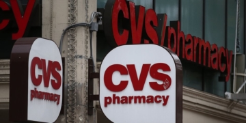 US pharmacy firm CVS to buy health insurer Aetna for $69bn