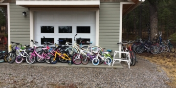 Retired B.C. builder dumpster dives for bikes, fixes hundreds for kids