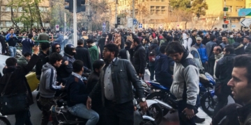Iran state TV says 9 more killed as protests continue for 6th day