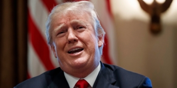 Trump's grasp of policy under question after contradictory tweets on surveillance