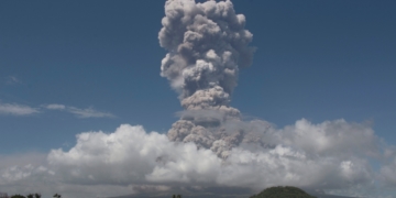 Philippine volcano explodes, authorities raise alert level