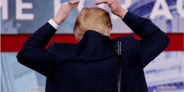 Bullish Trump jokes about hiding his bald spot