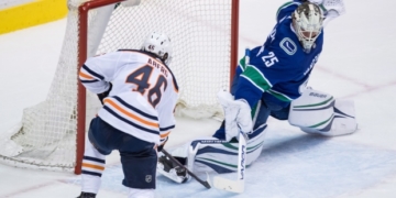 Jacob Markstrom backstops Canucks to tight victory over Oilers