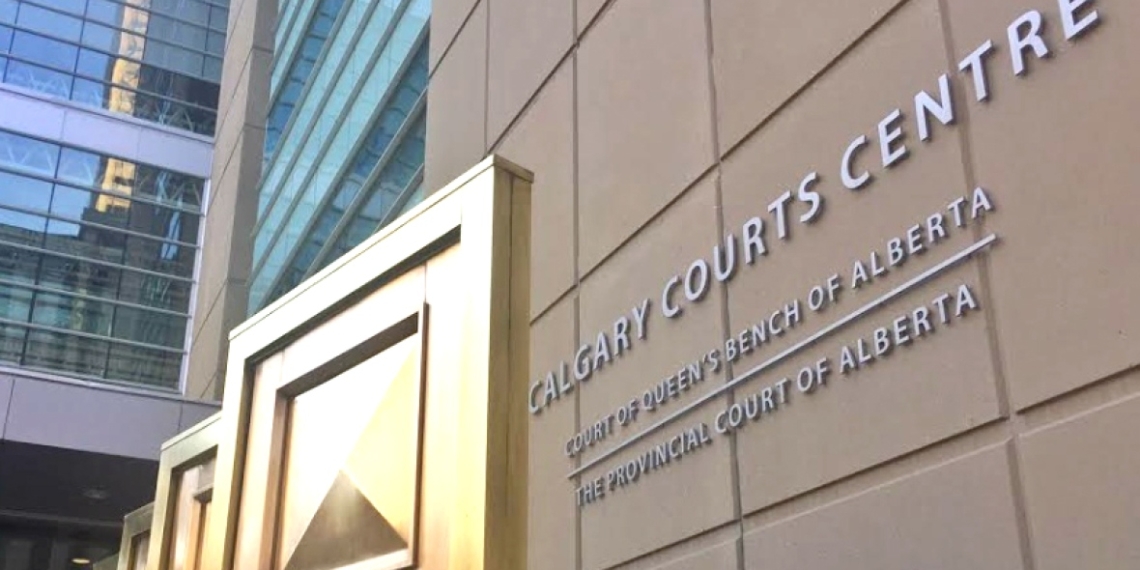 Religious mother accused of causing son's death turns up at court after warrants issued