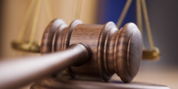 Polish firm sued over tricking homeless into flu vaccine test