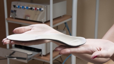 Customized shoe orthotics seem no better than over-the-counter insoles for plantar heel pain
